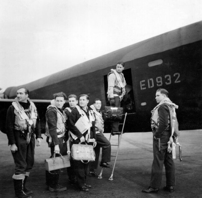Leader of the Dambusters Raid, Wing Commander Guy Gibson, seen with his crew as they board their Avro Lancaster III ED932/AJ-G for the Dams' Raid of 16/17 May 1943. Crown Copyright, MOD.