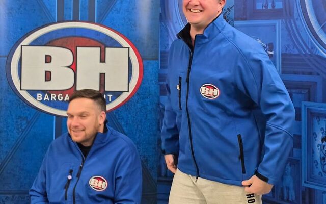 Dan and Mike in blue team outfits on Bargain Hunt set