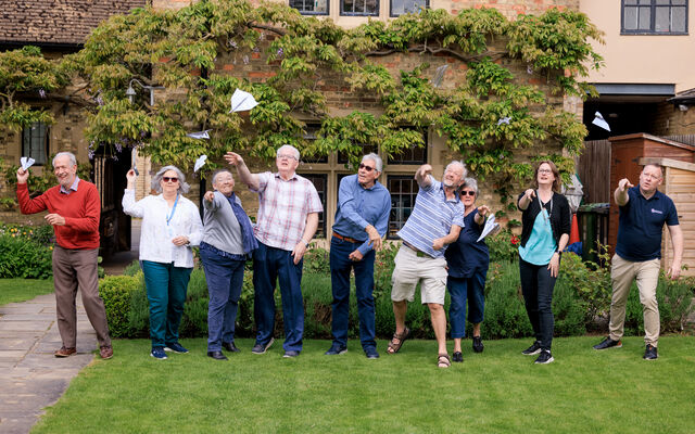 Group taking part in Tin Foil Challenge on lawn