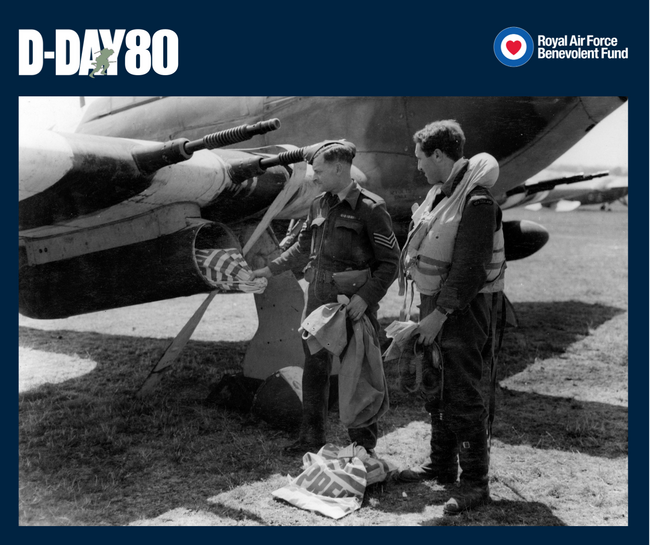 Sergeant H Stillwell unloads mail bags from the underwing tanks of a Hawker Hurricane IIC of 1697 (Air Despatch Delivery Service) Flight at Northolt, Middlesex, B2/Bazenville after a flight from B2/Bazenville in Normandy on 29 June 1944. The pilot, Flight Lieutenant WV Melbourne, looks on.