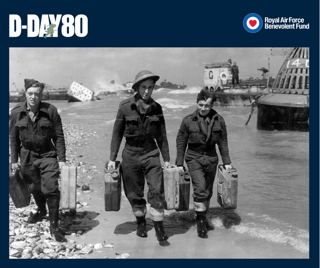 Leading Aircraftsmen G Harvey (left) and L Sexton, centre, with Flight Sergeant JE Gould, of 107 Beach Flight carrying jerricans of petrol along a beach in Normandy, 22 June 1944.