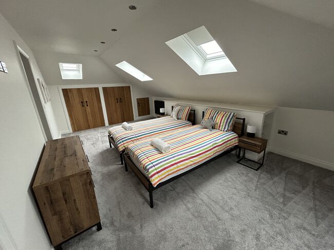 large bedroom with twin beds
