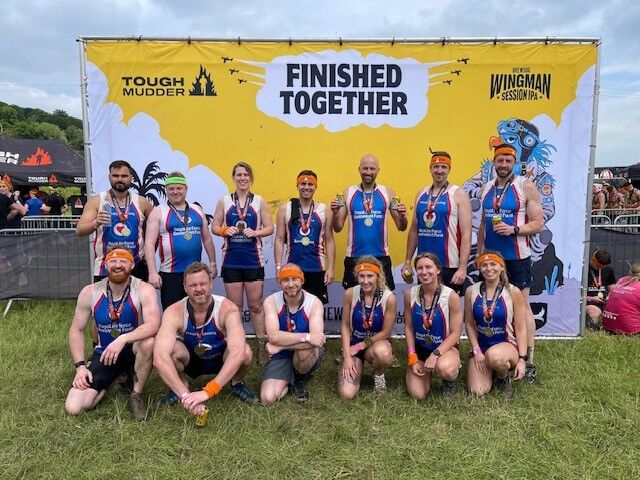 RAF Halton team posing with medals at finish