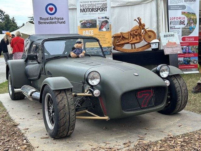 Car at Goodwood with teddy on top