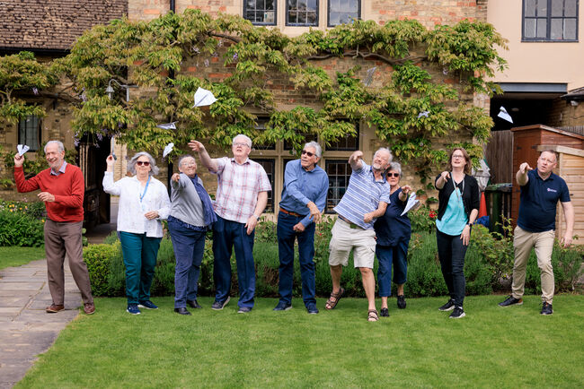 Group taking part in Tin Foil Challenge on lawn